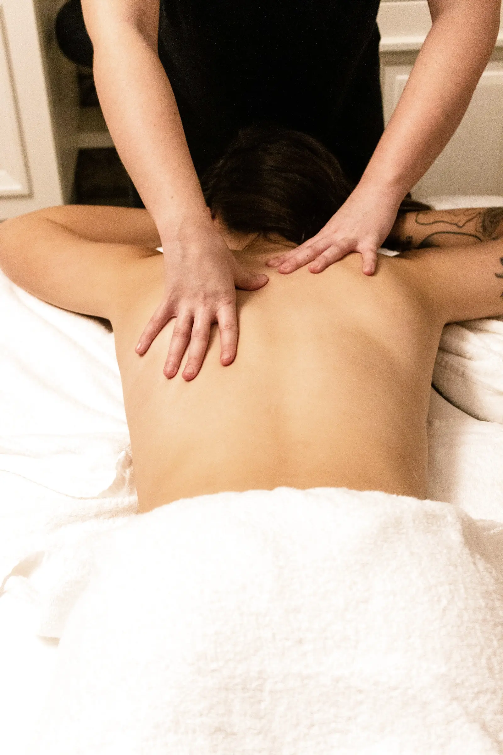 Therapist performing a real back massage